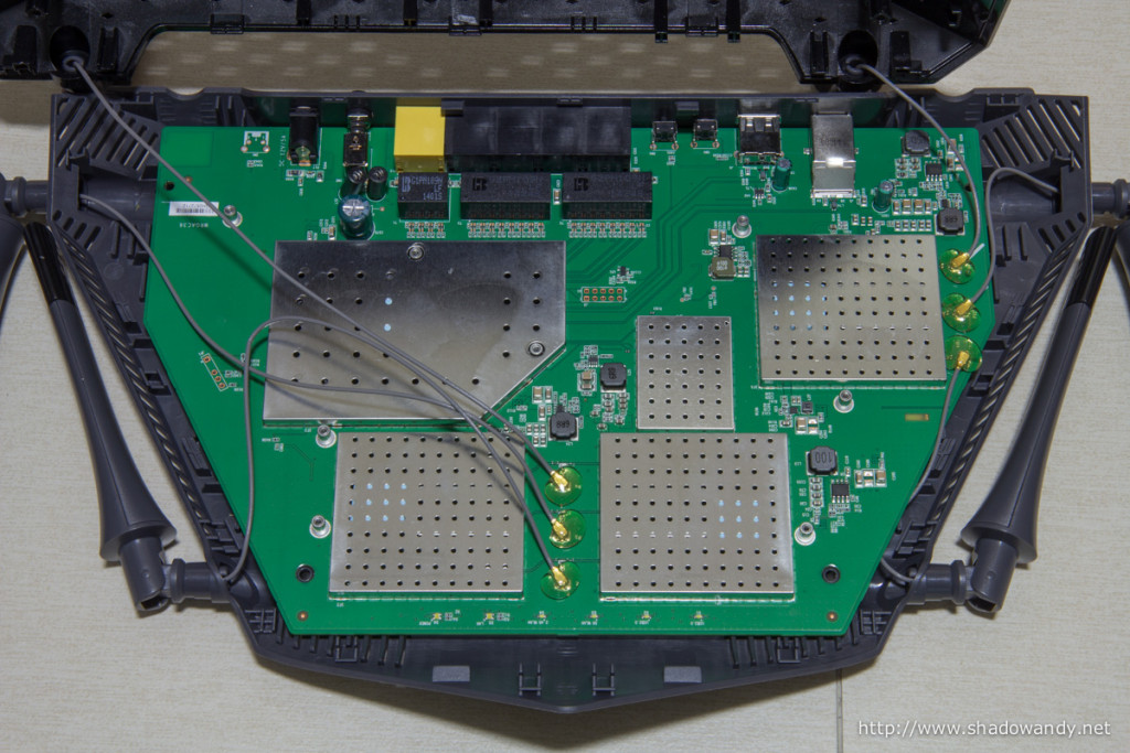 Beneath the heat sink are the CPU, WiFi radios, PCI Express switch