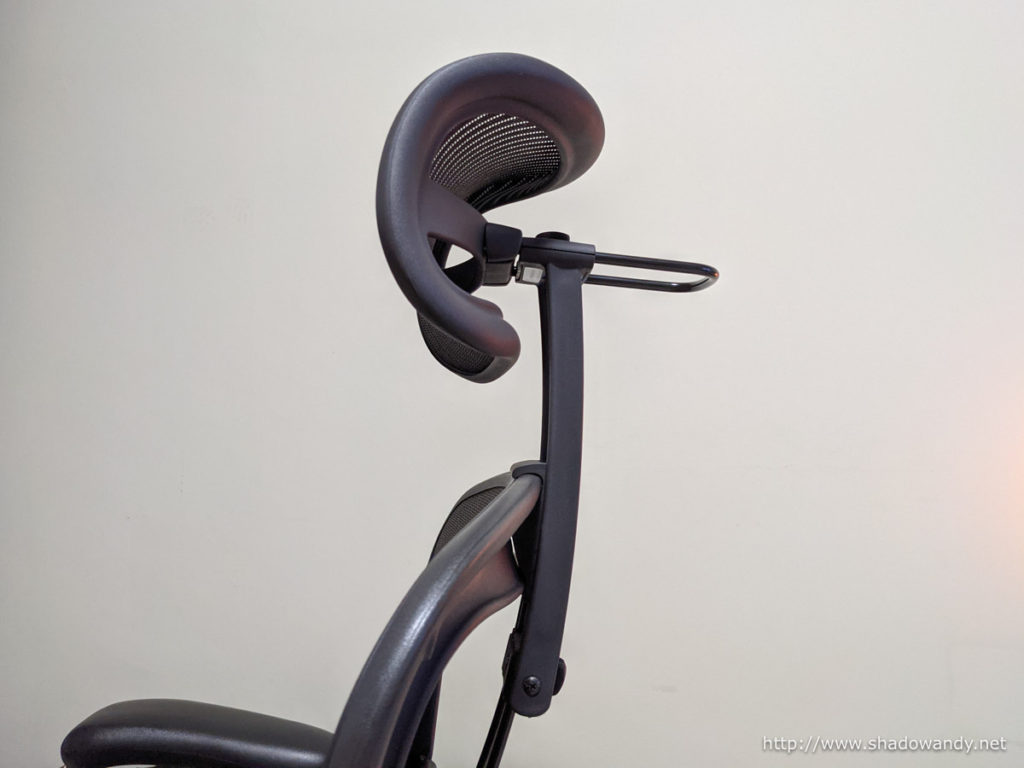 The Atlas head support attaches to the back of the Aeron chair.